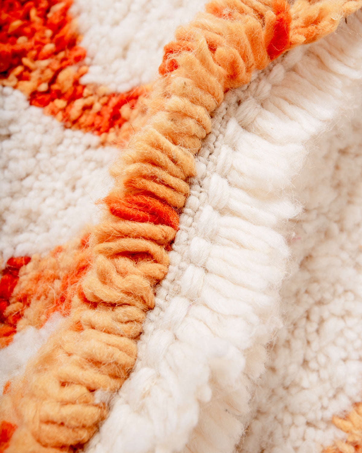 Modern, designer, handcrafted Berber rug from Morocco. Beniourain carpet with beautiful colours and patterns and fluffy wool texture.